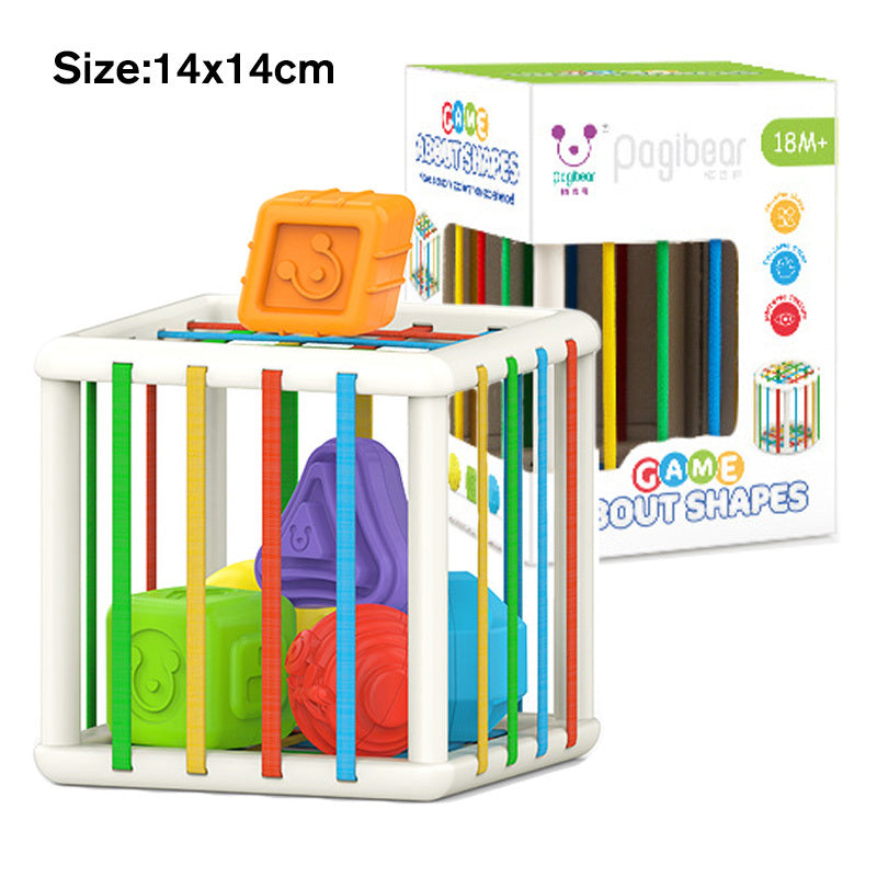 Colorful toy with shapes and a box labeled Game About Shapes on a white background.