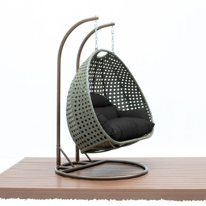 LeisureMod Beige Wicker Hanging 2 person Egg Swing Chair Black Side View.