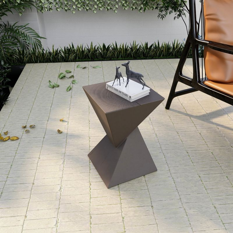 LeisureMod Glint Collection Fiberglass Outdoor Side Table in Grey on Patio.