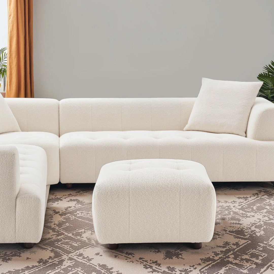 Kaynes Chic Tufted Ivory Boucle Ottoman in Living Room.
