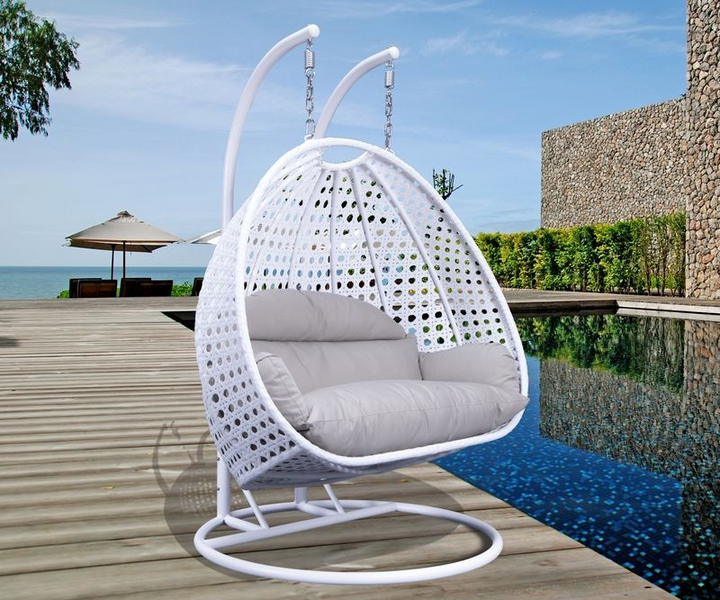 LeisureMod White Wicker Hanging 2 person Egg Swing Chair White/Taupe Photo.