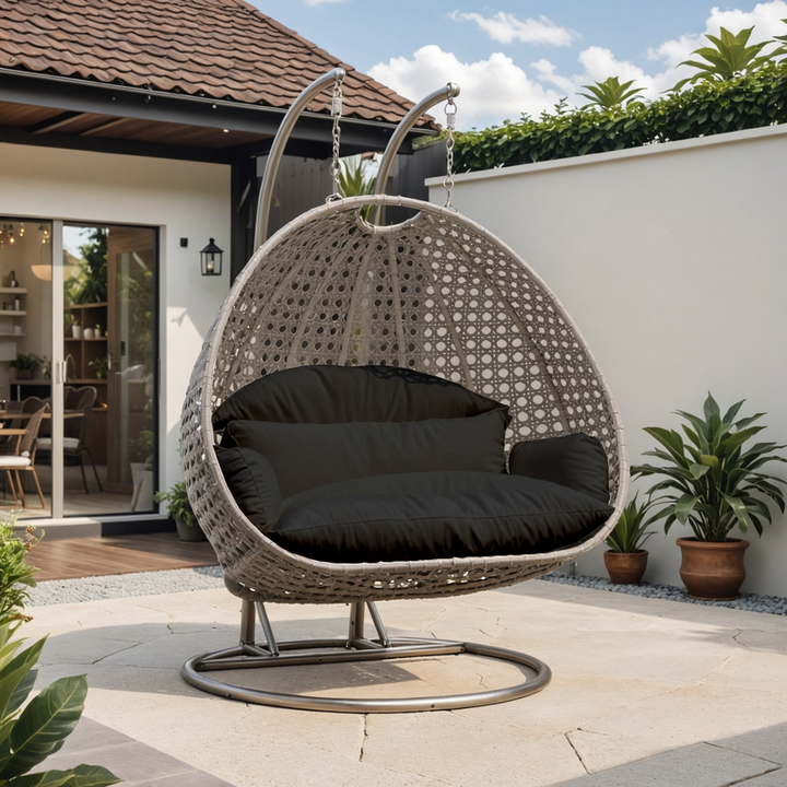 LeisureMod Beige Wicker Hanging 2 person Egg Swing Chair Black Front View.