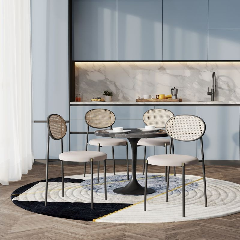 LeisureMod 5-Piece Dining Set with 36" Round Dining Table Black Sintered Stone Top and Black Pedestal with 4 Velvet Dining Chairs in Black Steel Legs in Beige in Room.