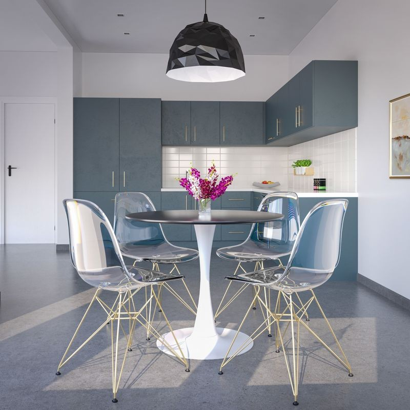 LeisureMod 5-Piece Dining Set with 35" Round Dining Table in White Iron Pedestal Base and 4 ABS Plastic Side Chair with Gold Base Clear in Room.