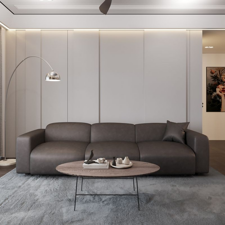 LeisureMod Whisper 6-Seater Conversation Set with Ottoman in Brown in Room.