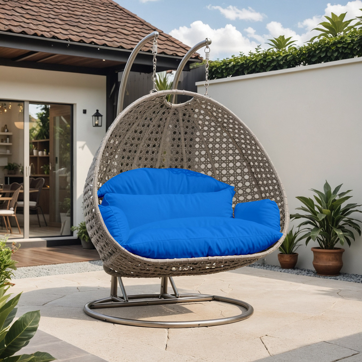 LeisureMod Beige Wicker Hanging 2 person Egg Swing Chair Blue Front View.