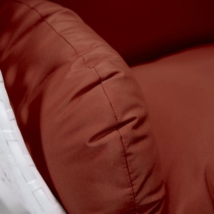 LeisureMod White Wicker Hanging Egg Swing Chair Cherry Cushion Closeup.