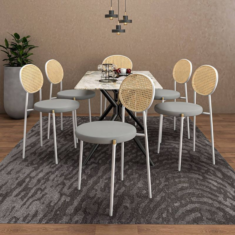 LeisureMod 7-Piece Dining Set with Rectangular Sintered Stone Dining Table and 6 Velvet Dining Side Chairs with Wicker Back Grey in Room.