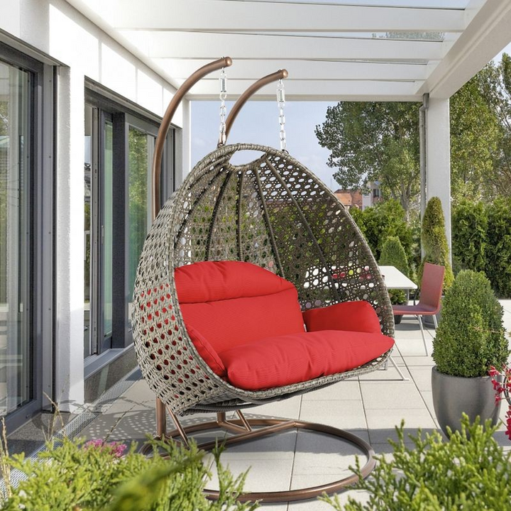 LeisureMod Beige Wicker Hanging 2 person Egg Swing Chair Red Side View.