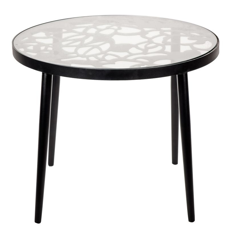 Round table with black frame and white patterned top on a white background.