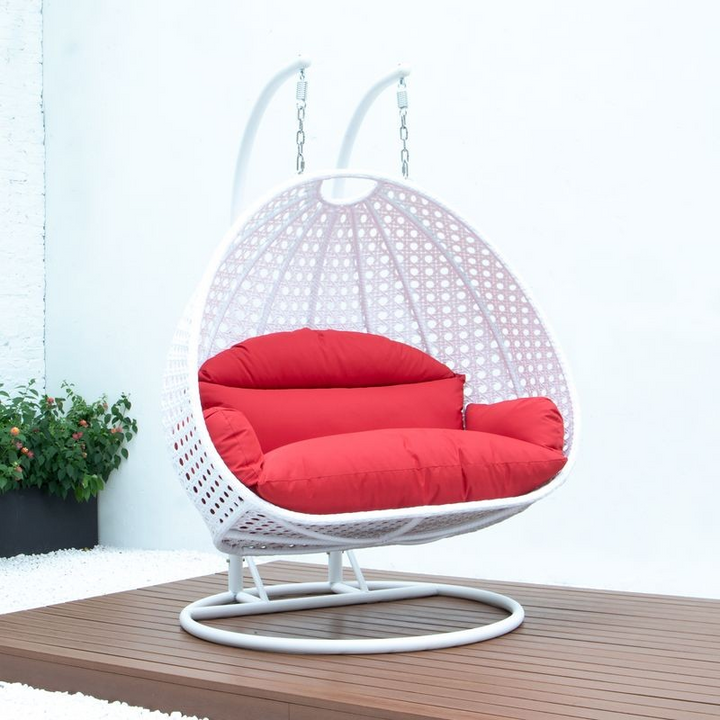 LeisureMod White Wicker Hanging 2 person Egg Swing Chair Red Photo.