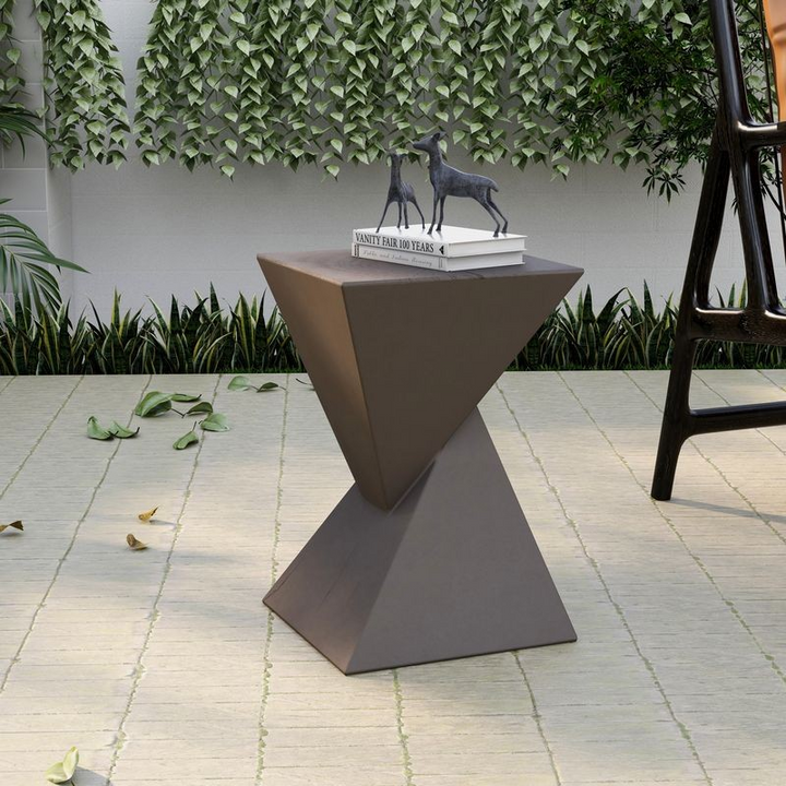 LeisureMod Glint Collection Fiberglass Outdoor Side Table in Grey Outside.