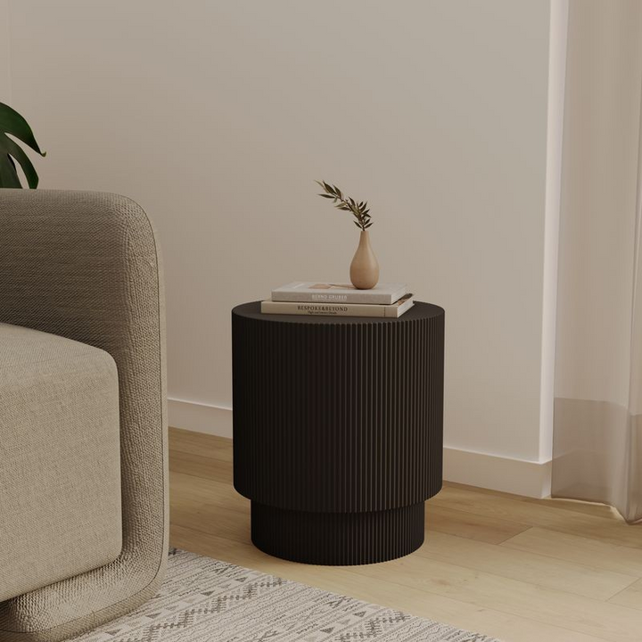 LeisureMod Eden Collection Fiberglass Outdoor Side Table in Black in Room.