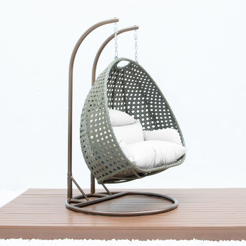 LeisureMod Beige Wicker Hanging 2 person Egg Swing Chair White Side View.