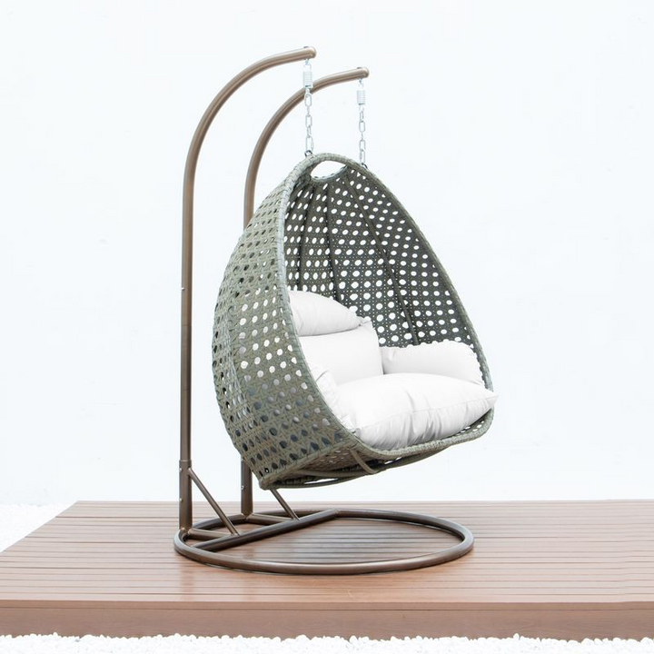 LeisureMod Beige Wicker Hanging 2 person Egg Swing Chair White Side View.