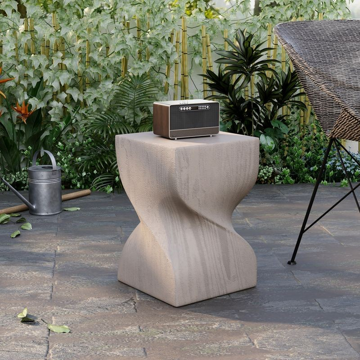 LeisureMod Onyx Collection Fiberglass Outdoor Side Table in Cream on Patio.