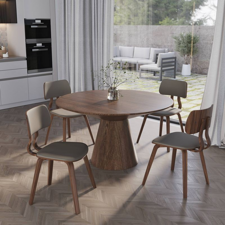 LeisureMod 5-Piece Dining Set with Round Wooden Table in Walnut and 4 Leather Dining Chairs in Walnut/Light Grey in Room.