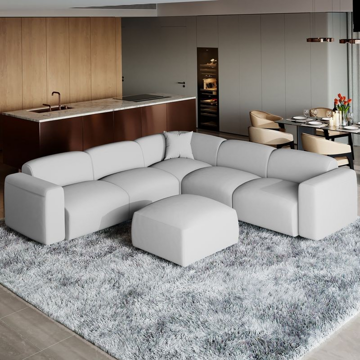 LeisureMod Whisper 4-Seater Conversation Set with a Chaise Lounge Chair in Taupe in Living Room.