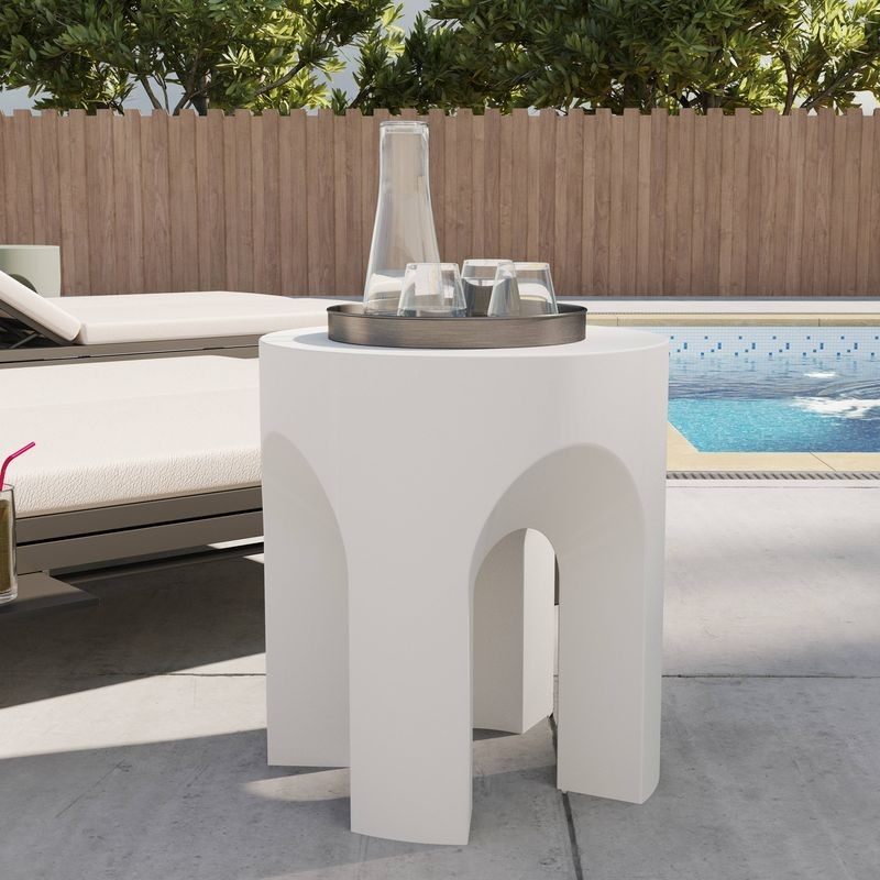 LeisureMod Crus Collection Fiberglass Outdoor Side Table in White Outside.