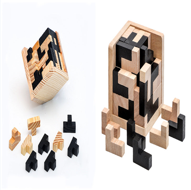Wooden puzzle with black and natural wood pieces on a white background.