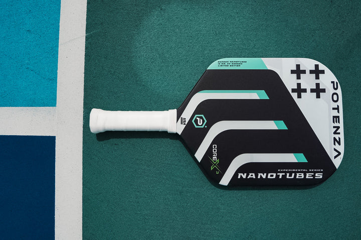 Carbon Nanotubes+ COREx3 Pickleball Paddle on Court.