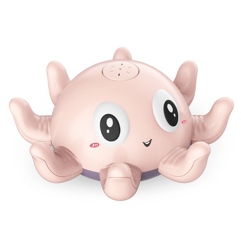 Pink octopus-shaped toy with large eyes on a white background.