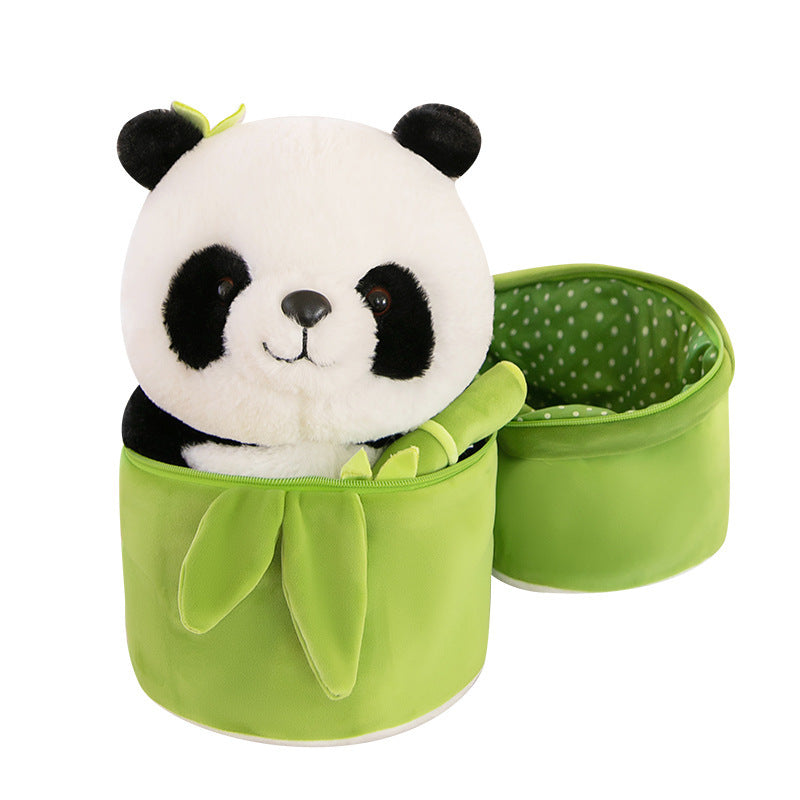 Plush panda toy with green bamboo basket on a white background.