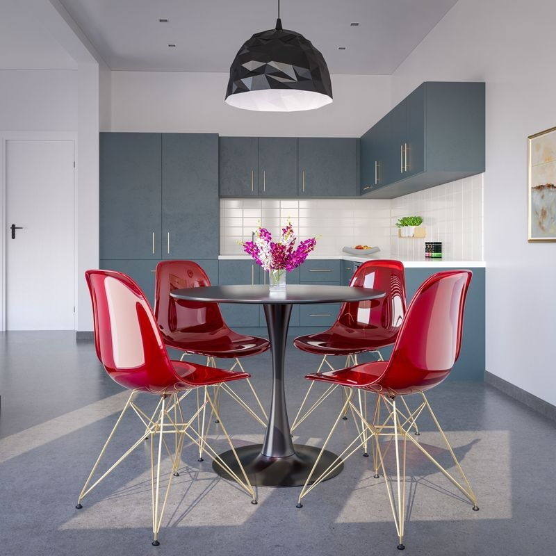 LeisureMod Cresco Molded Eiffel Side Chair with Gold Base Transparent Red at Table.