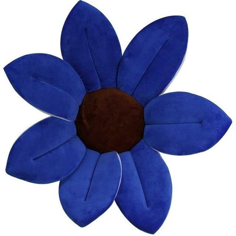 Blue flower-shaped cushion with a brown center on a white background.
