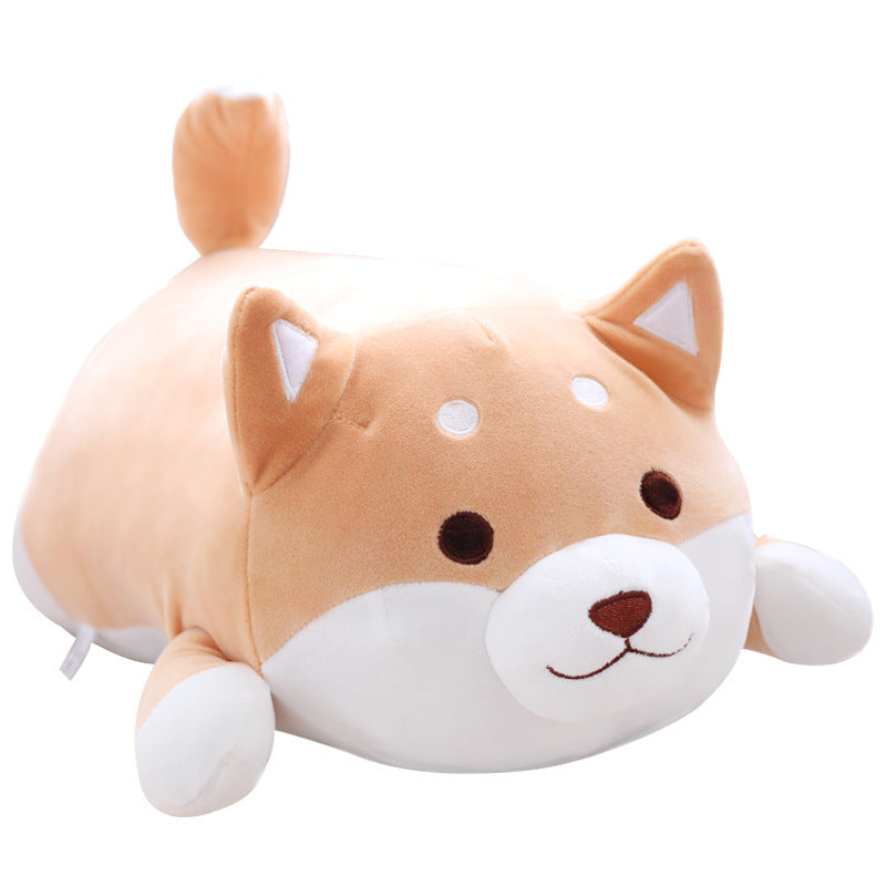 Cute plush toy shaped like a dog on a white background.