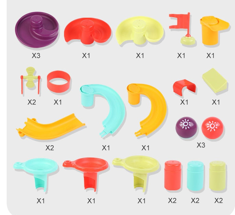 Set of colorful plastic mold shapes on a white background.