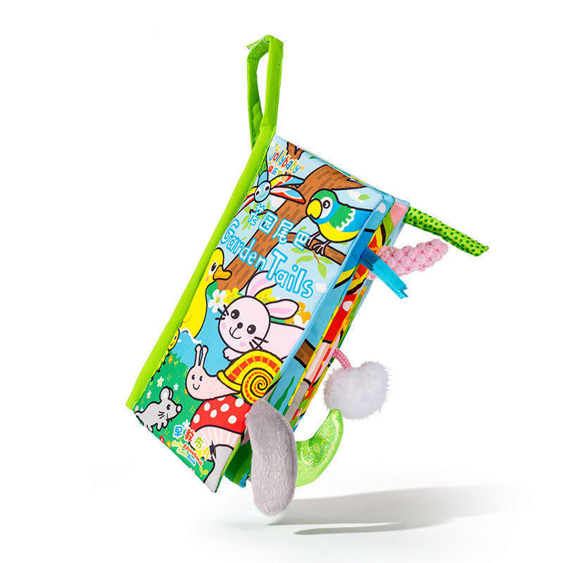 Colorful children's book with soft toys on a white background.