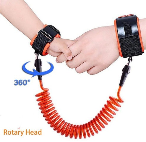 Two hands holding a red safety leash with a black connector, on a white background.