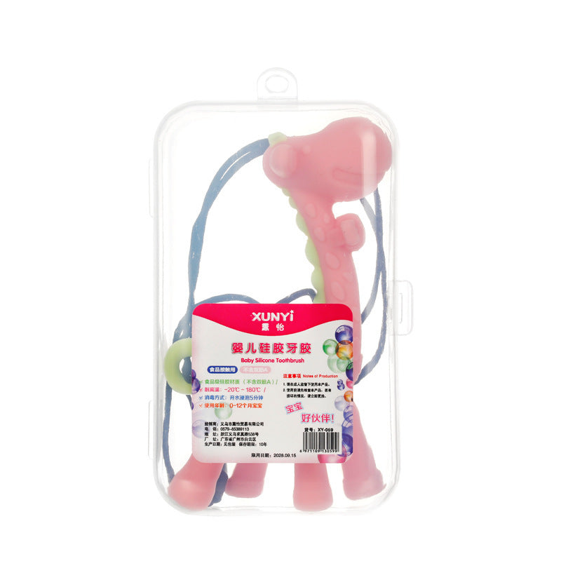 Baby silicone toothbrush with pink handle and blue bristles in packaging on a white background.