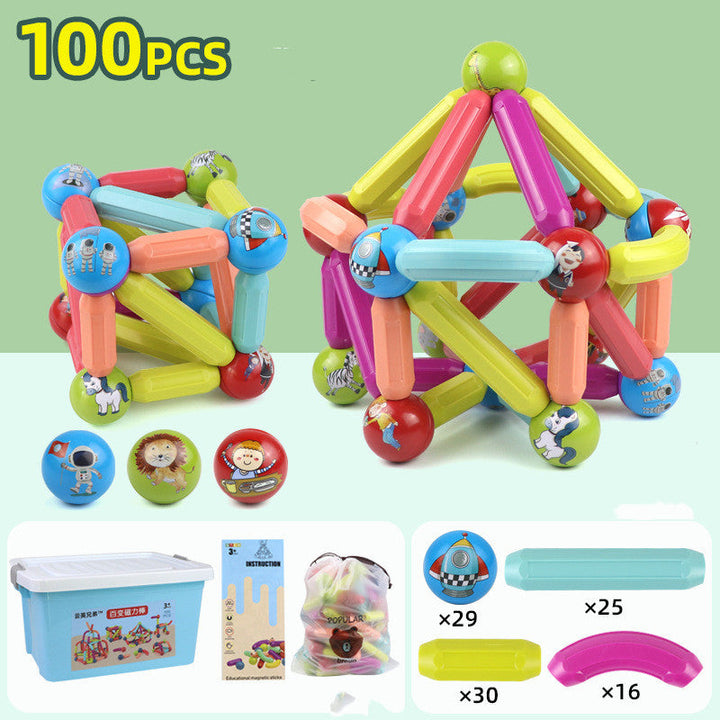 Colorful magnetic building blocks set with storage container and accessories on a light green background.