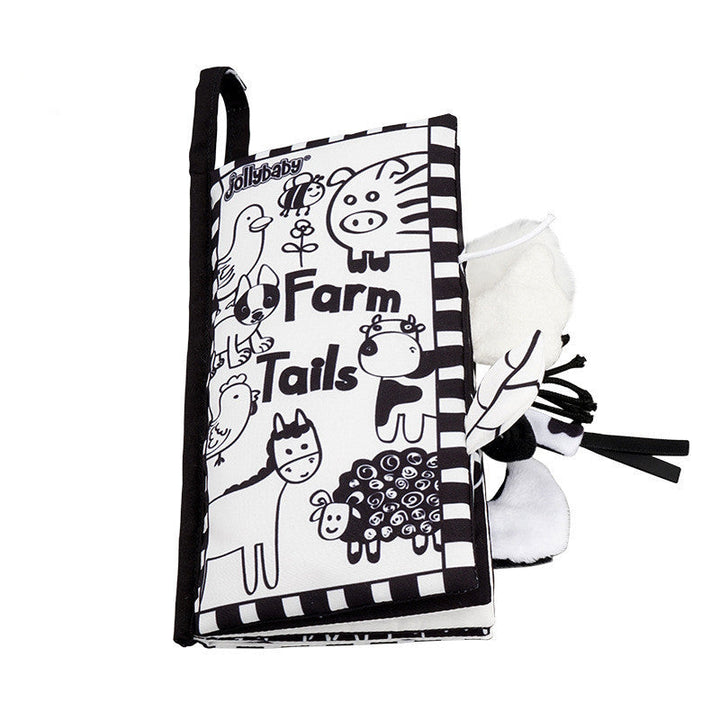 Black and white book with farm animal illustrations and a sock on a white background.