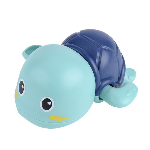 Toy turtle with blue shell on a white background.
