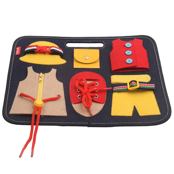 Children's dress-up toy set with various accessories on a black tray.