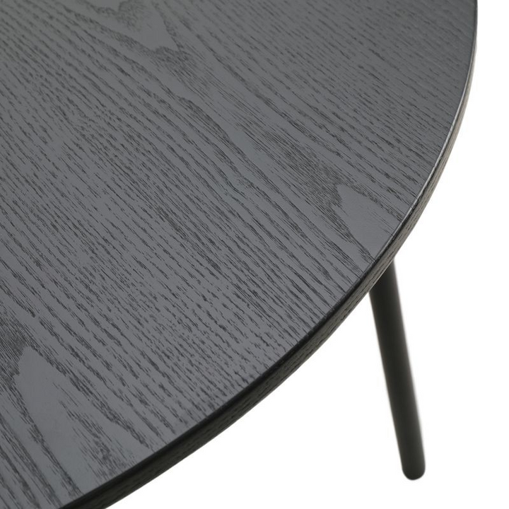 LeisureMod Tule Modern 71" Oval Dining Table with MDF Top and Black Steel Legs in Black Closeup.