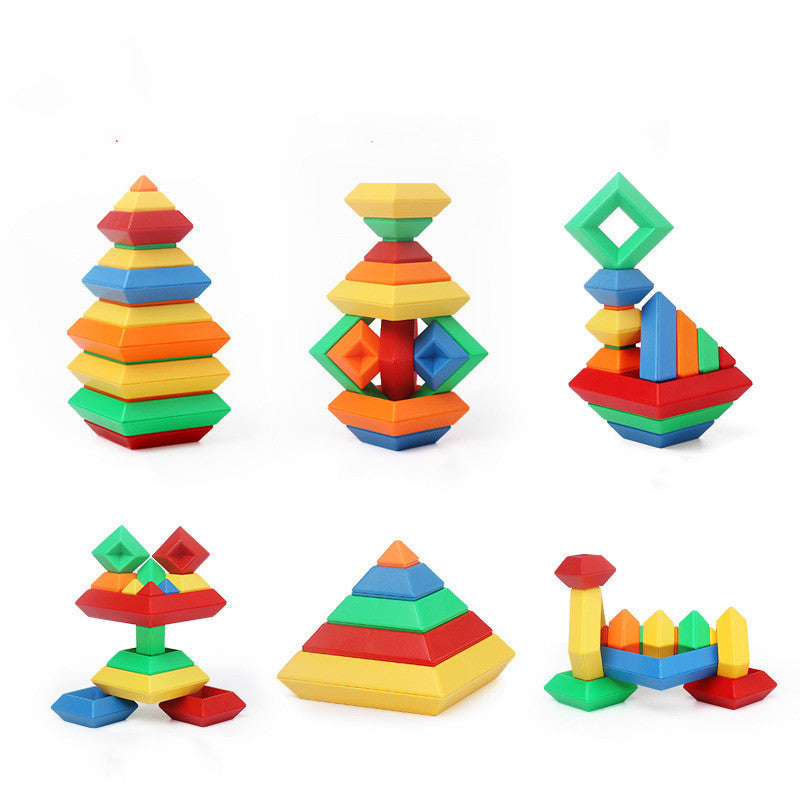 Set of colorful geometric stacking toys on a white background.