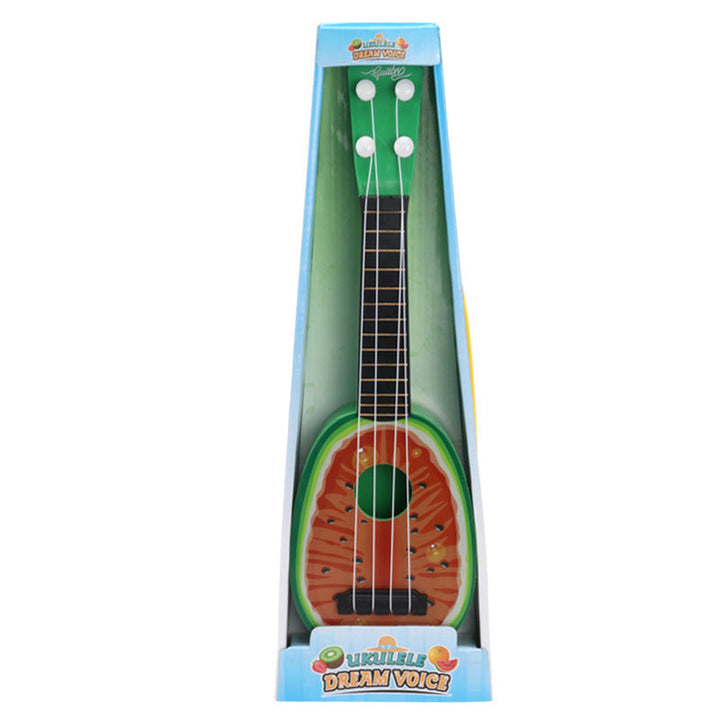 Toy guitar shaped like a watermelon in packaging on a white background.