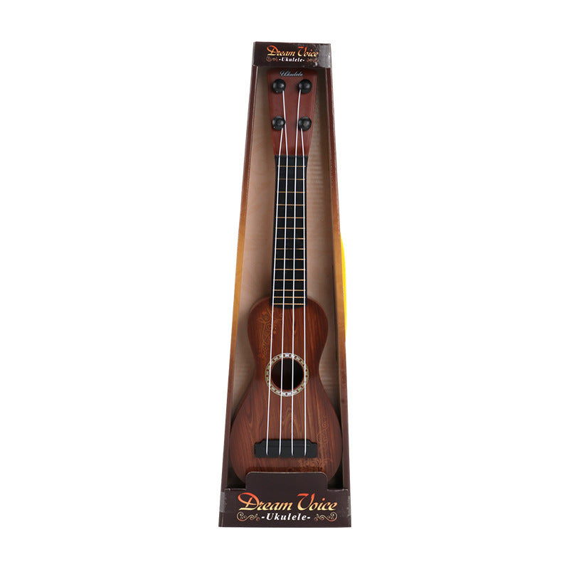 Dream Chaser ukulele in packaging on a white background.