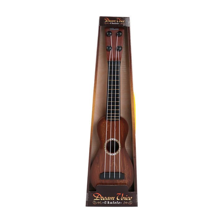 Dream Chaser ukulele in packaging on a white background.