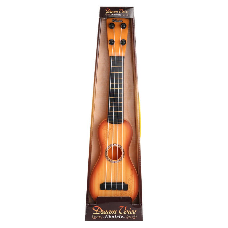 Dream Voice ukulele in packaging on a white background.