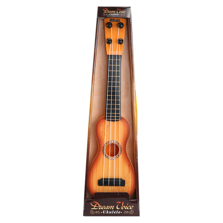 Dream Voice ukulele in packaging on a white background.