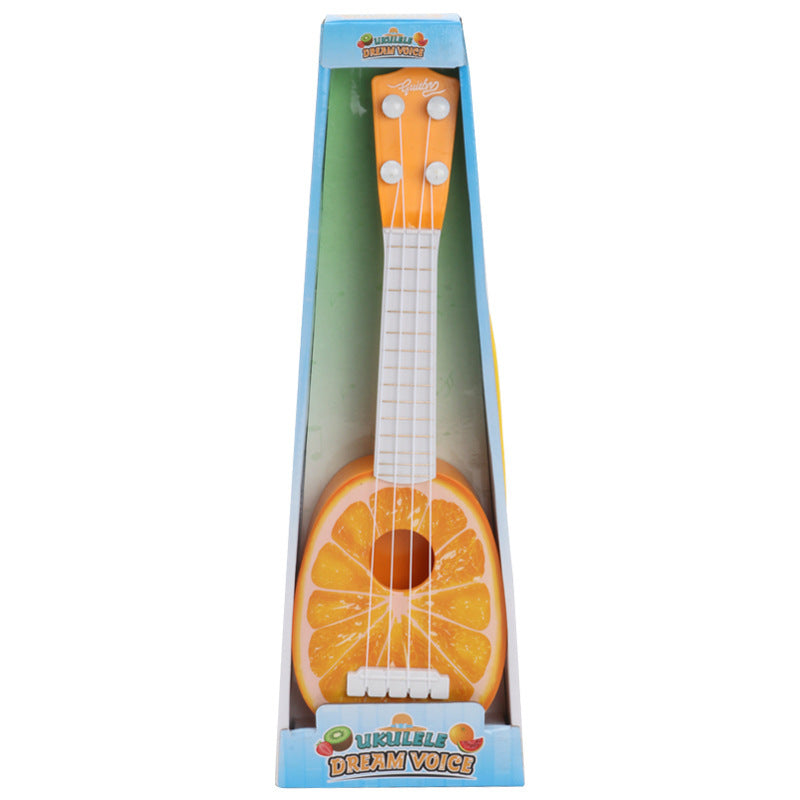 Toy guitar shaped like an orange in its packaging on a white background.