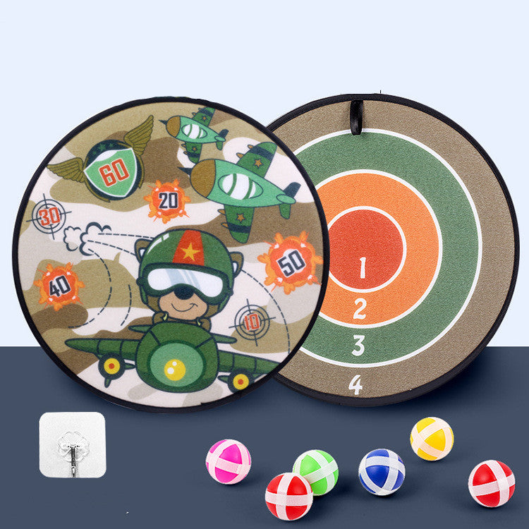 Children's dartboard with cartoon design and colorful darts on a blue background.
