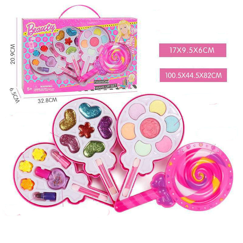 Toy makeup set with packaging, including palettes and applicators, on a white background.