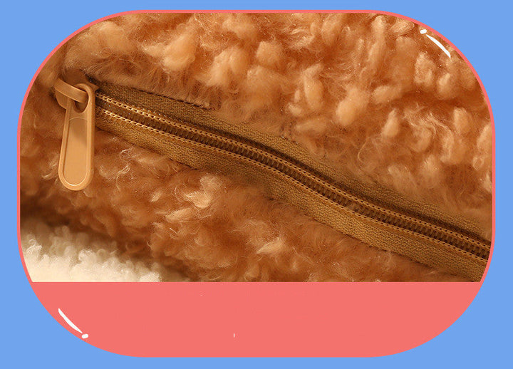 Close-up with a gold zipper on a blue background.