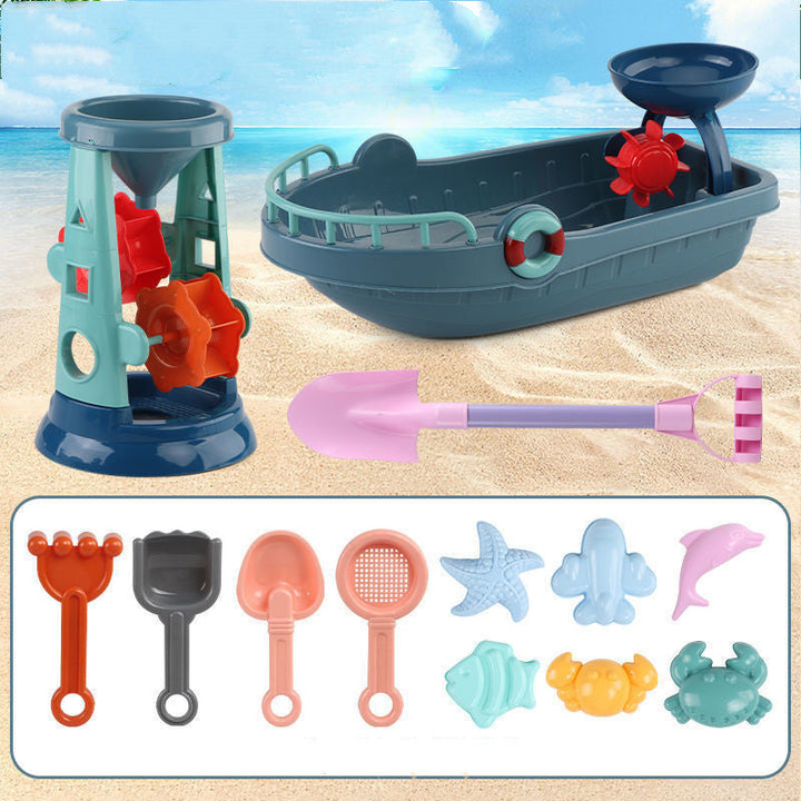 Set of beach toys including a ship, sandcastle mold, and various tools on a sandy background.